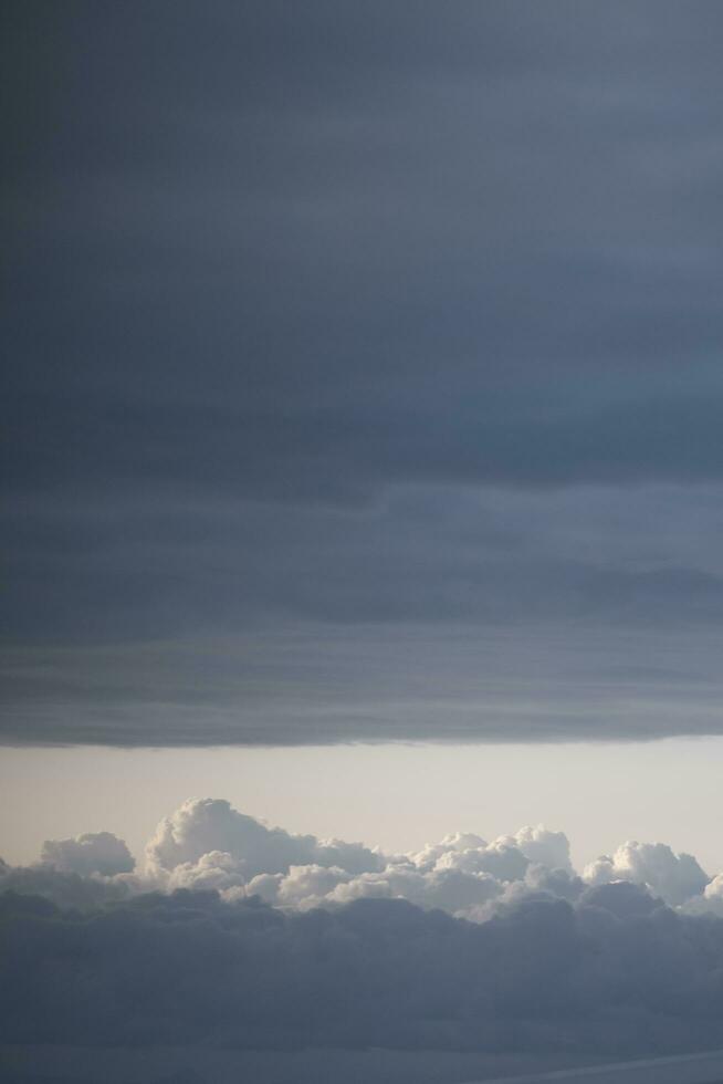clouds over the sky by sunset photo