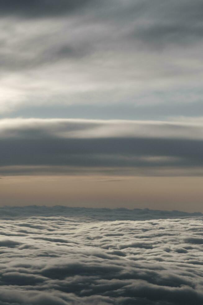 clouds over the sky by sunset photo