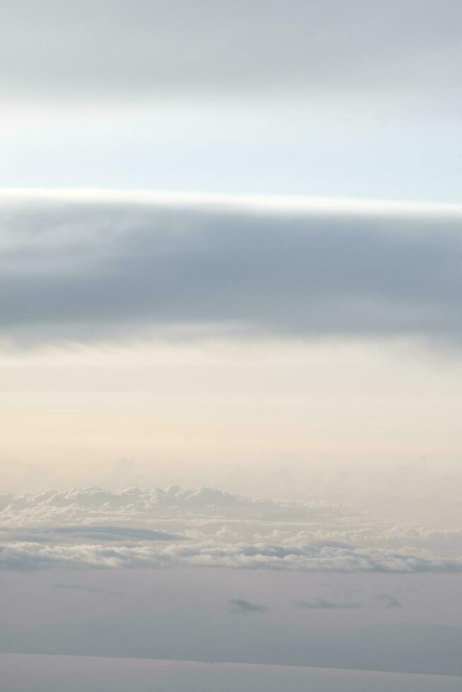 clouds over the sky by sunset photo