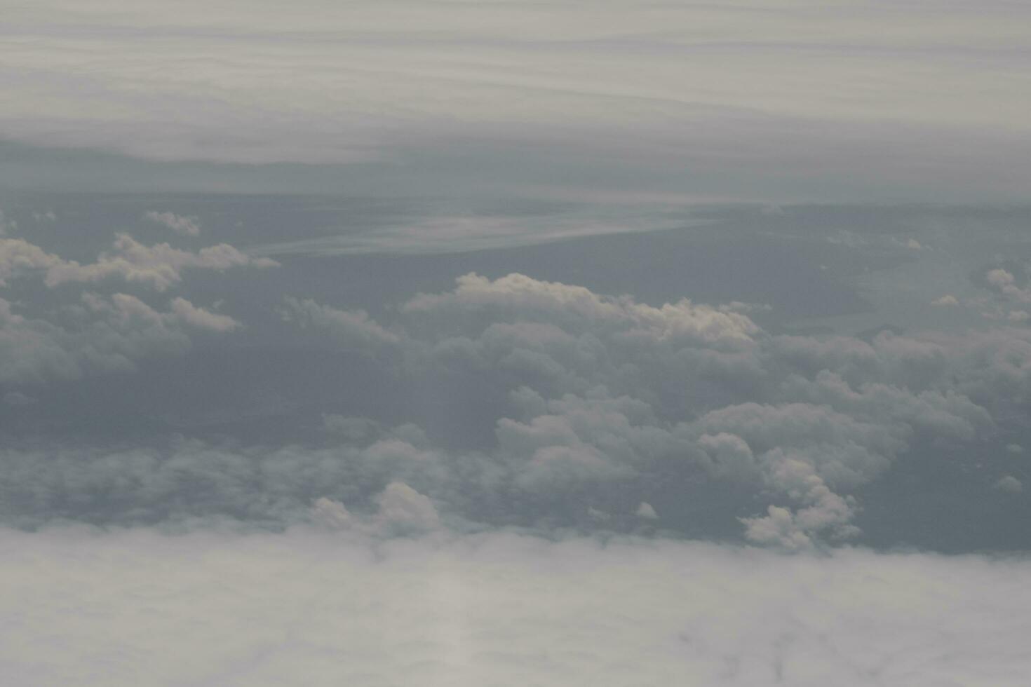 clouds over the sky and sea photo