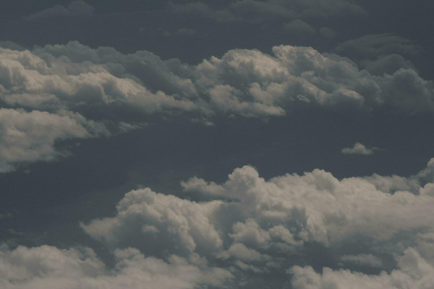 clouds over the sky and sea photo