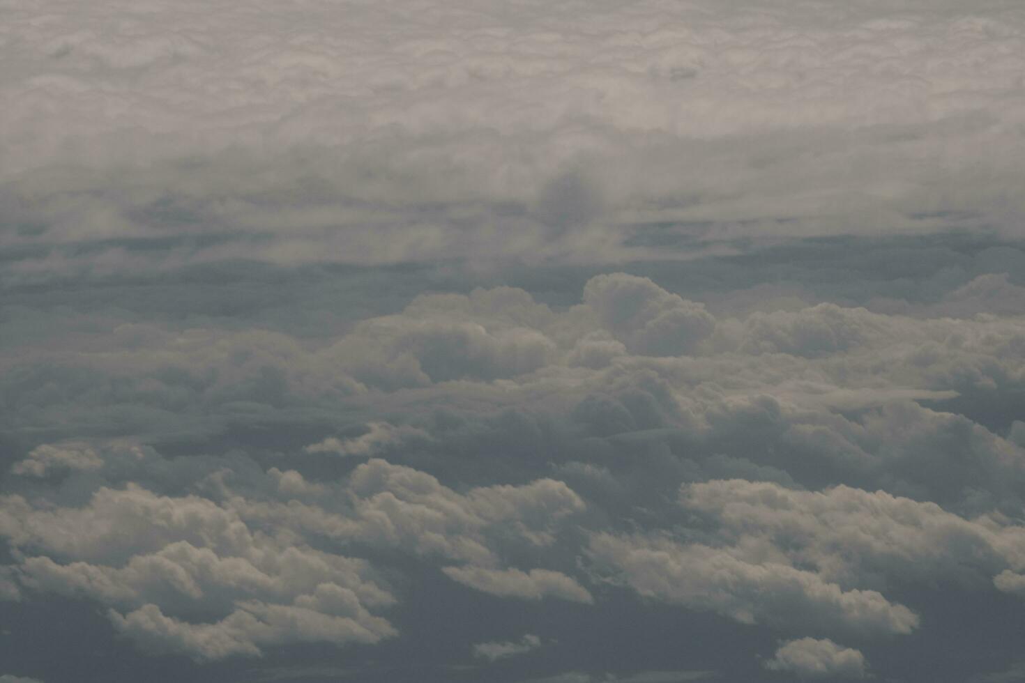 clouds over the sky and sea photo