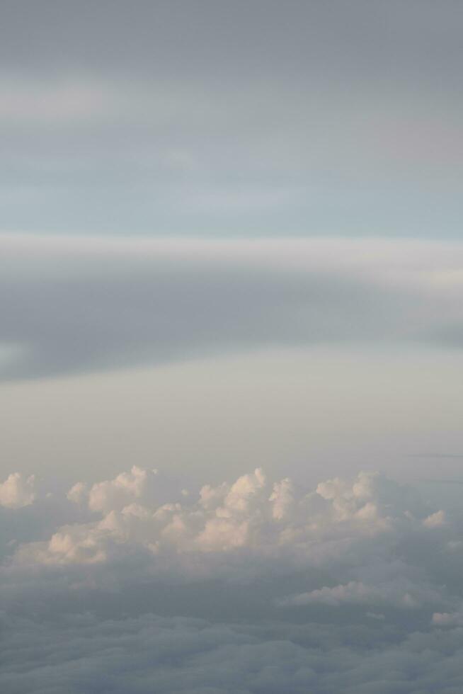 clouds over the sky by sunset photo