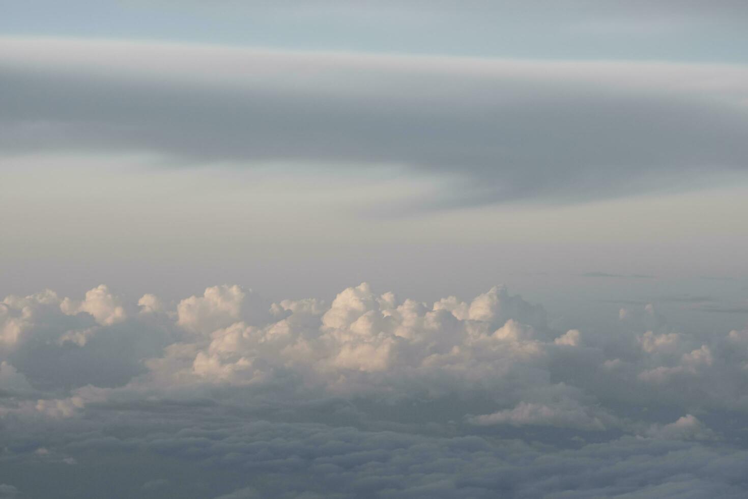 clouds over the sky by sunset photo