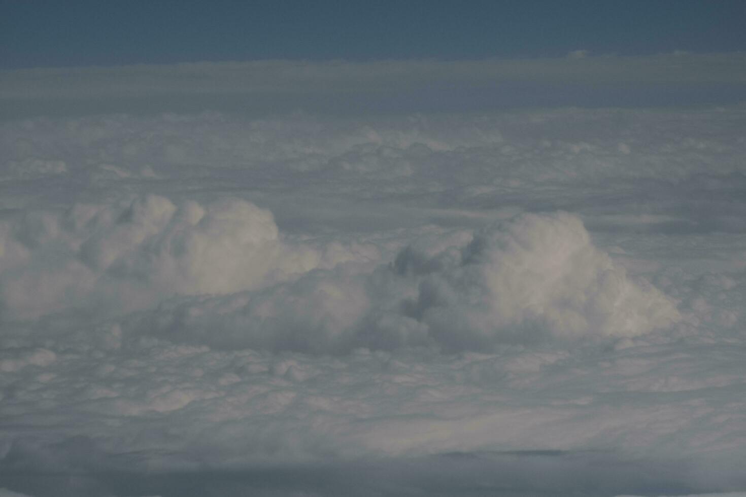 clouds over the sky and sea photo