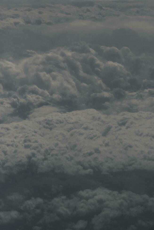 clouds over the sky and sea photo