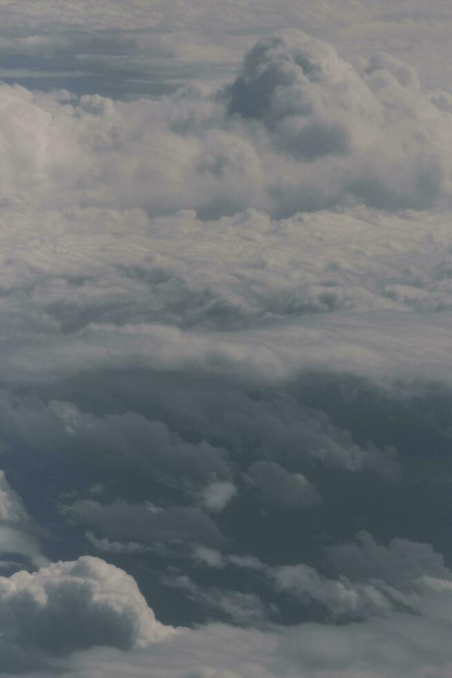 clouds over the sky and sea photo