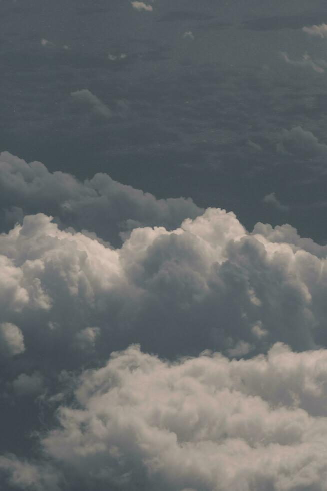 clouds over the sky and sea photo