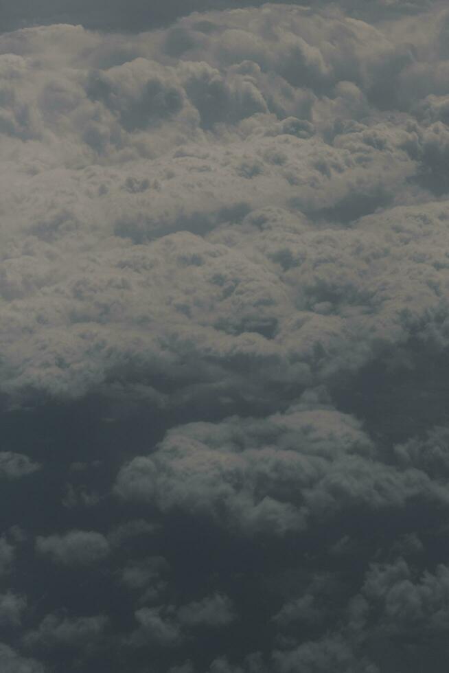 clouds over the sky and sea photo