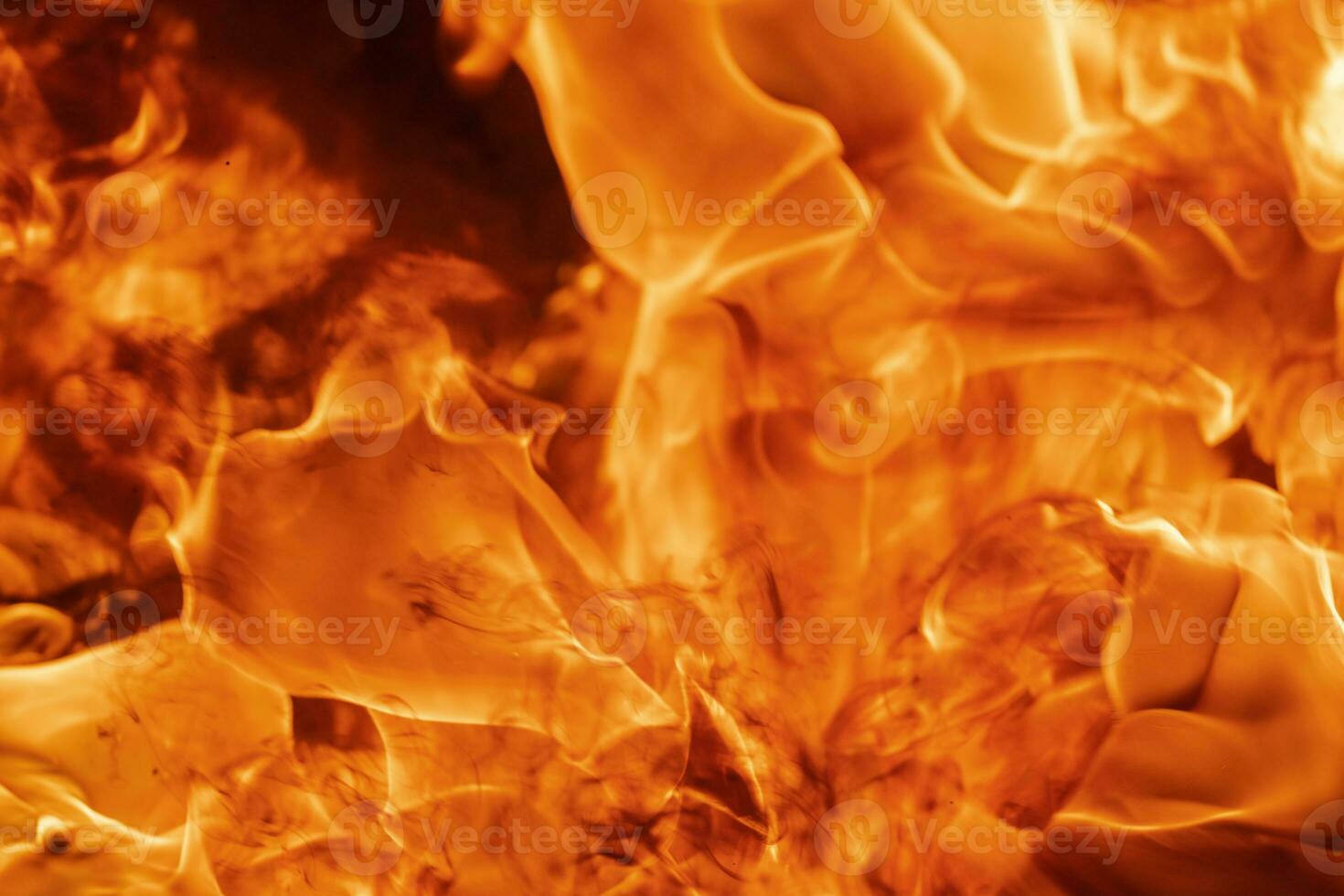 Flames red fire natural background. Beautiful dangerous firestorm abstract texture photo