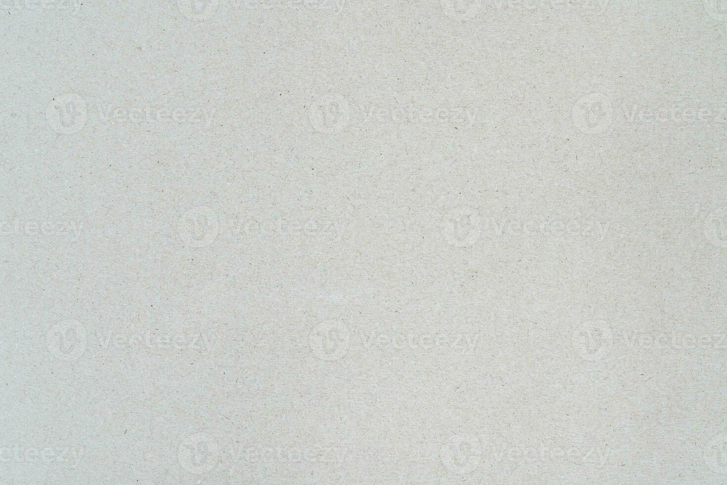 Gray background sheet of recycled cardboard. Close-up abstract texture carton photo