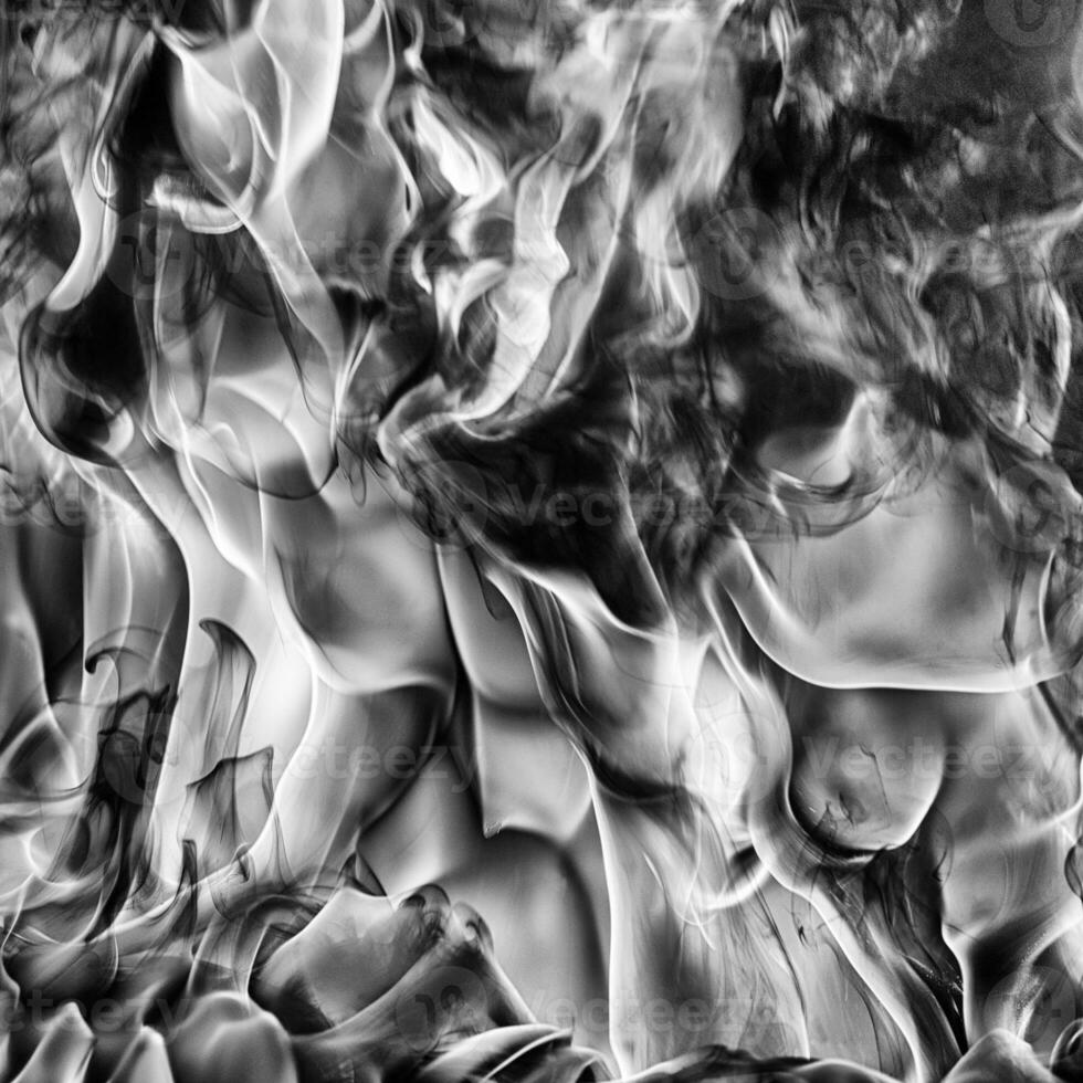 Abstract plume of natural black smoke, huge flame of strong fire, motion blur from fire photo