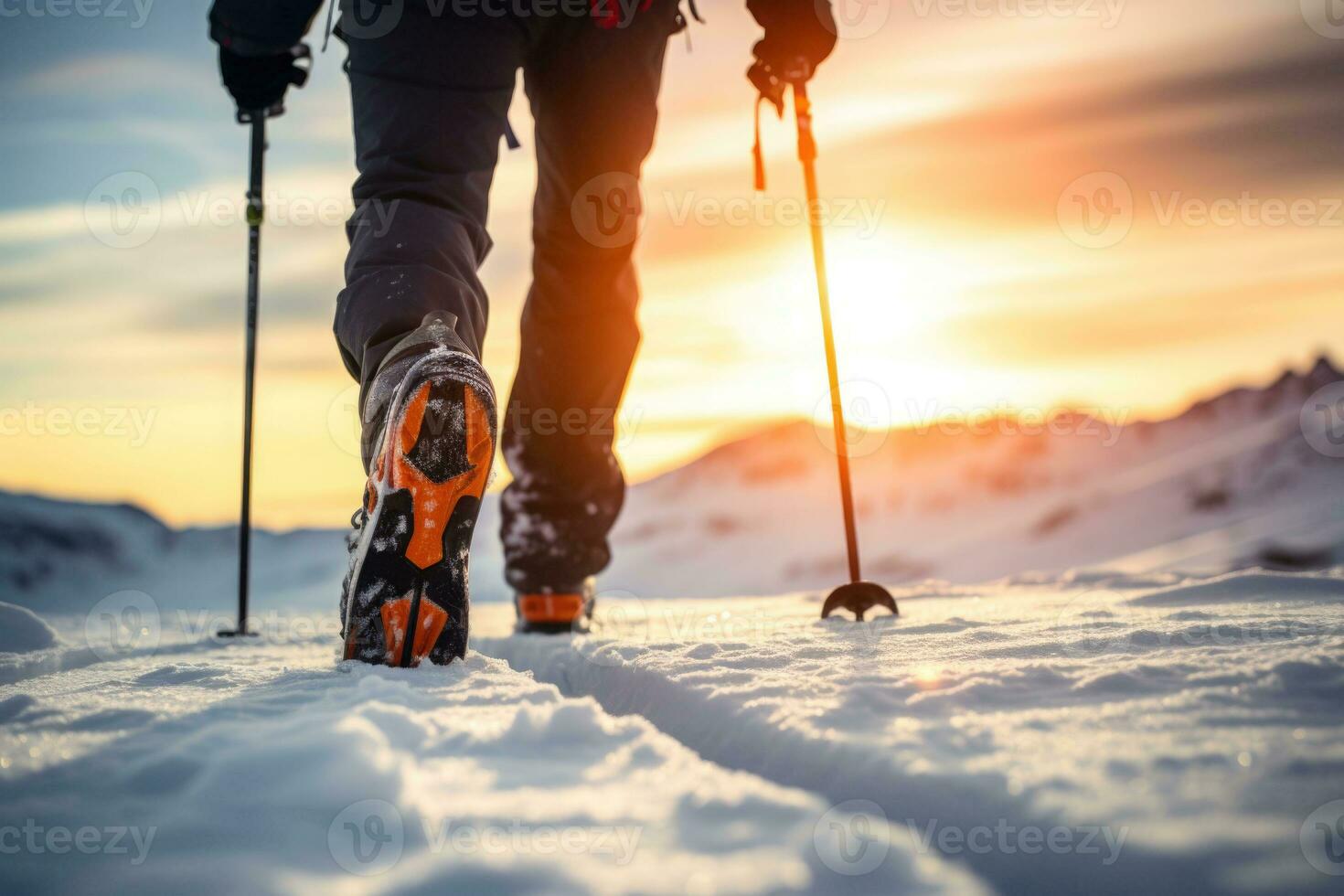 Man's legs in mountain skis and ski poles on the snow. Blurry mountains on the background. Generative AI photo