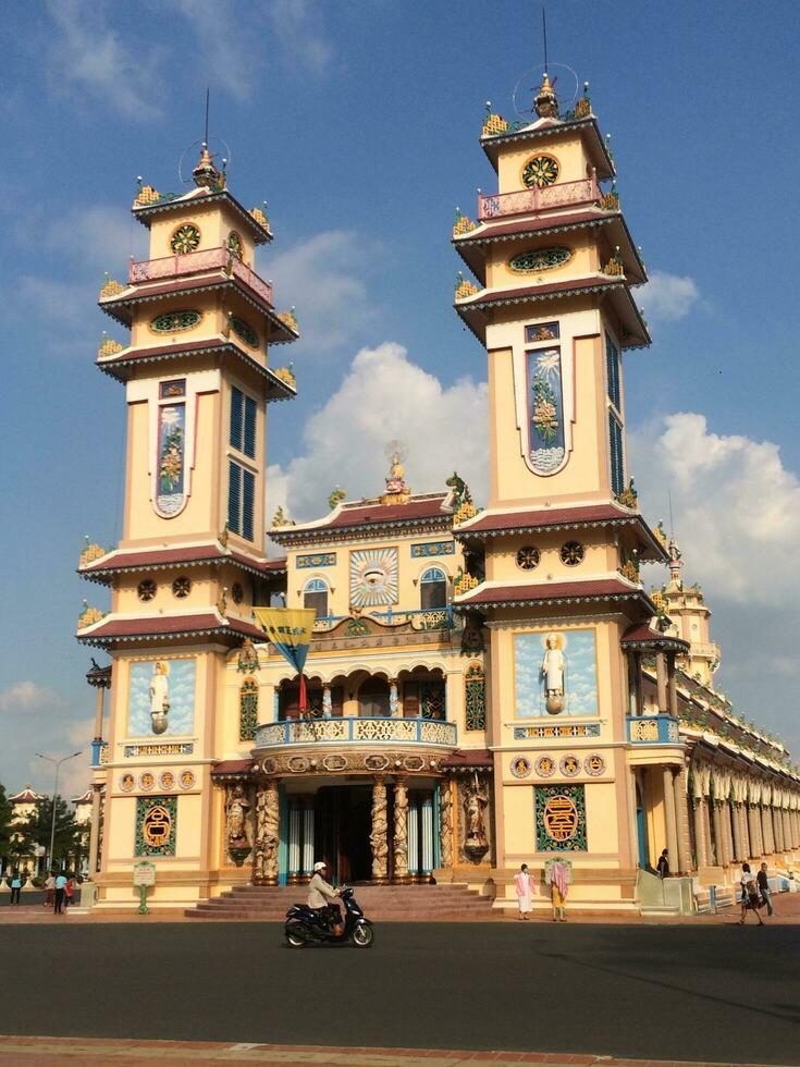 Cao Dai pagoda in Vietnam scene sunny photo