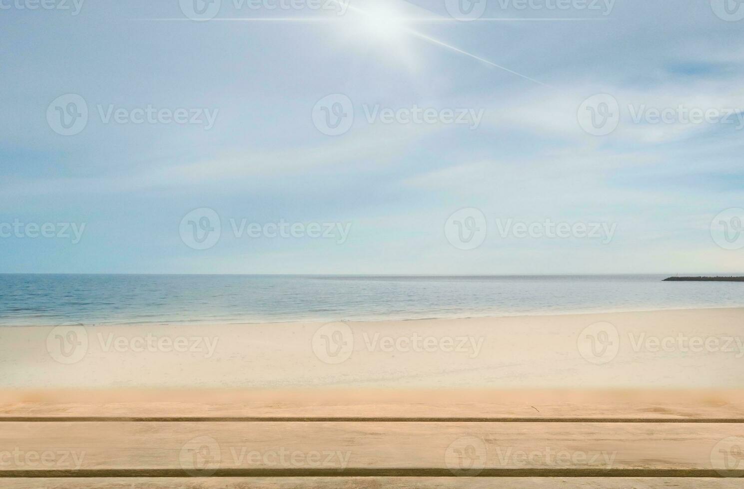 Blank wooden table on the beach and sea landscape background for product display montage photo