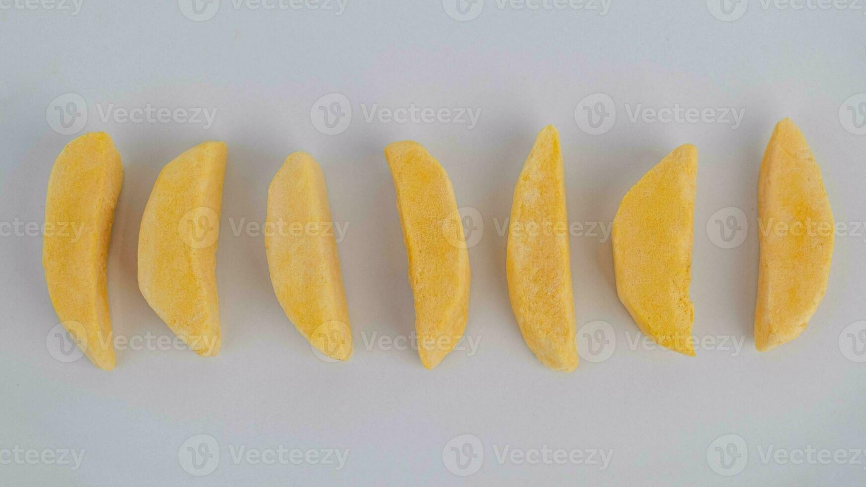 Healthy freeze dried fruits. Pieces of mango with freeze dry process