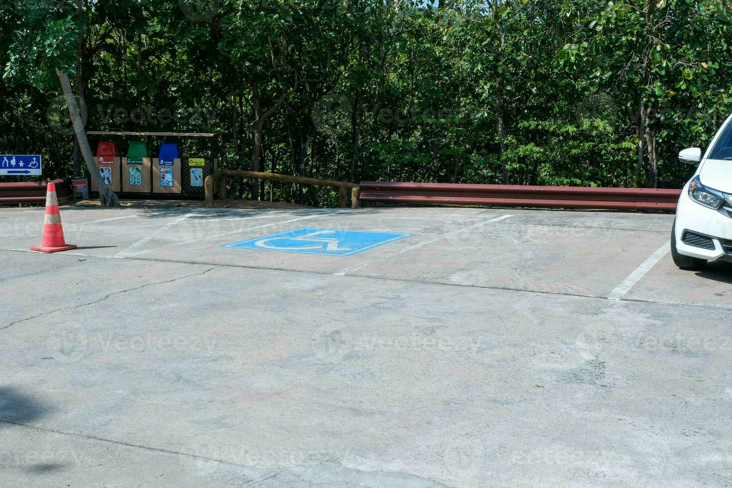 View of handicapped parking in a tourist attraction in Thailand. Parking with a special place for the disabled. photo