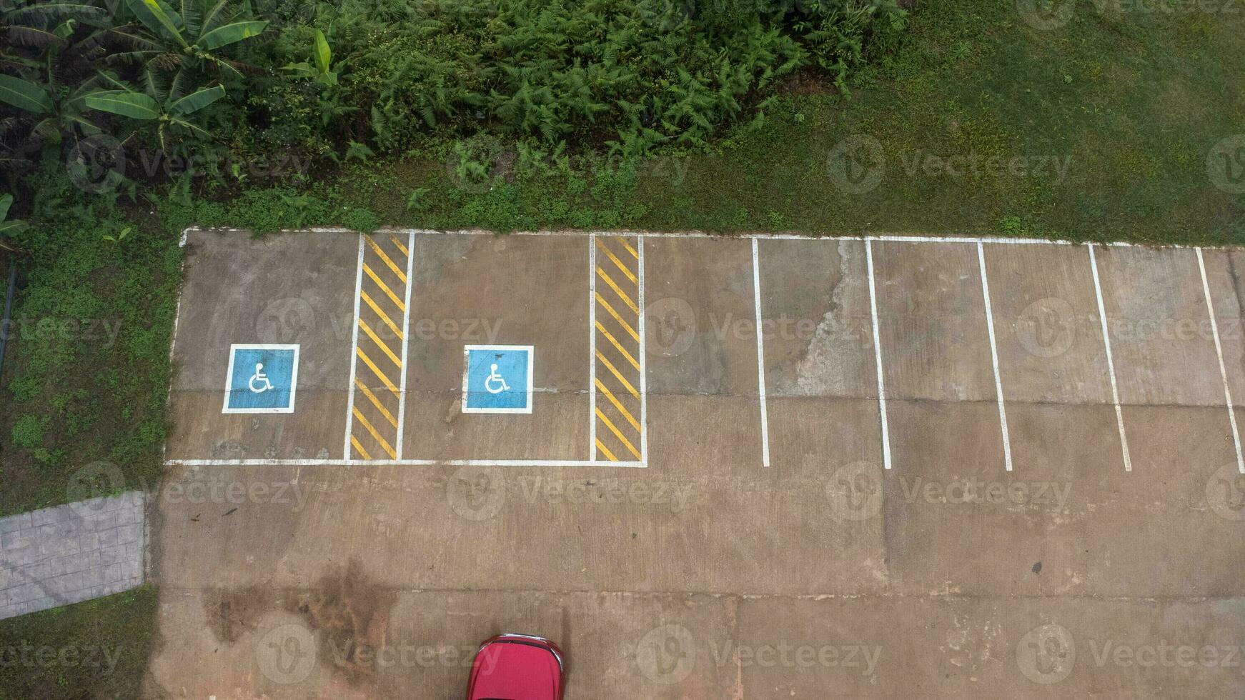 Aerial view of handicapped parking spaces in tourist destinations in Thailand. Parking with a special place for the disabled. photo