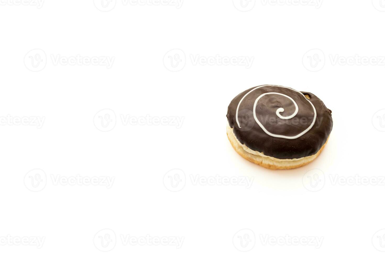 Messy chocolate donut isolated on white background. After some edits. photo