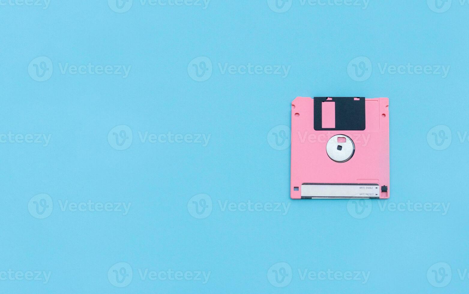 Floppy disk isolated on blue background. After some edits. photo