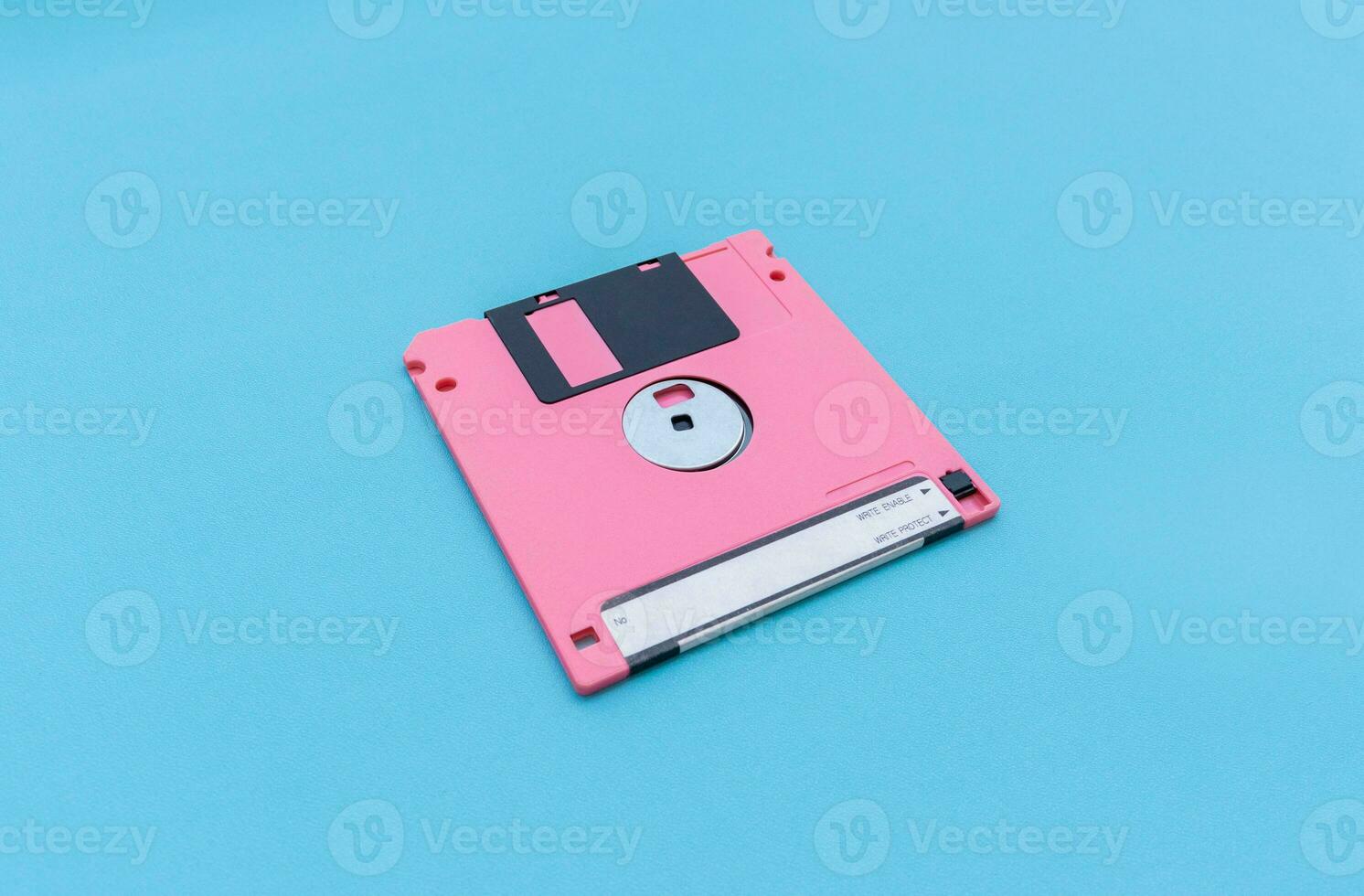 Floppy disk isolated on blue background. After some edits. photo