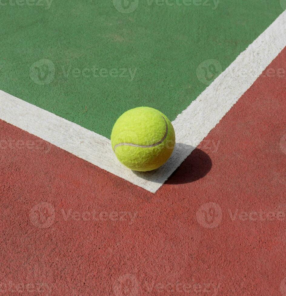 Tennis ball on the court, after some edits. photo