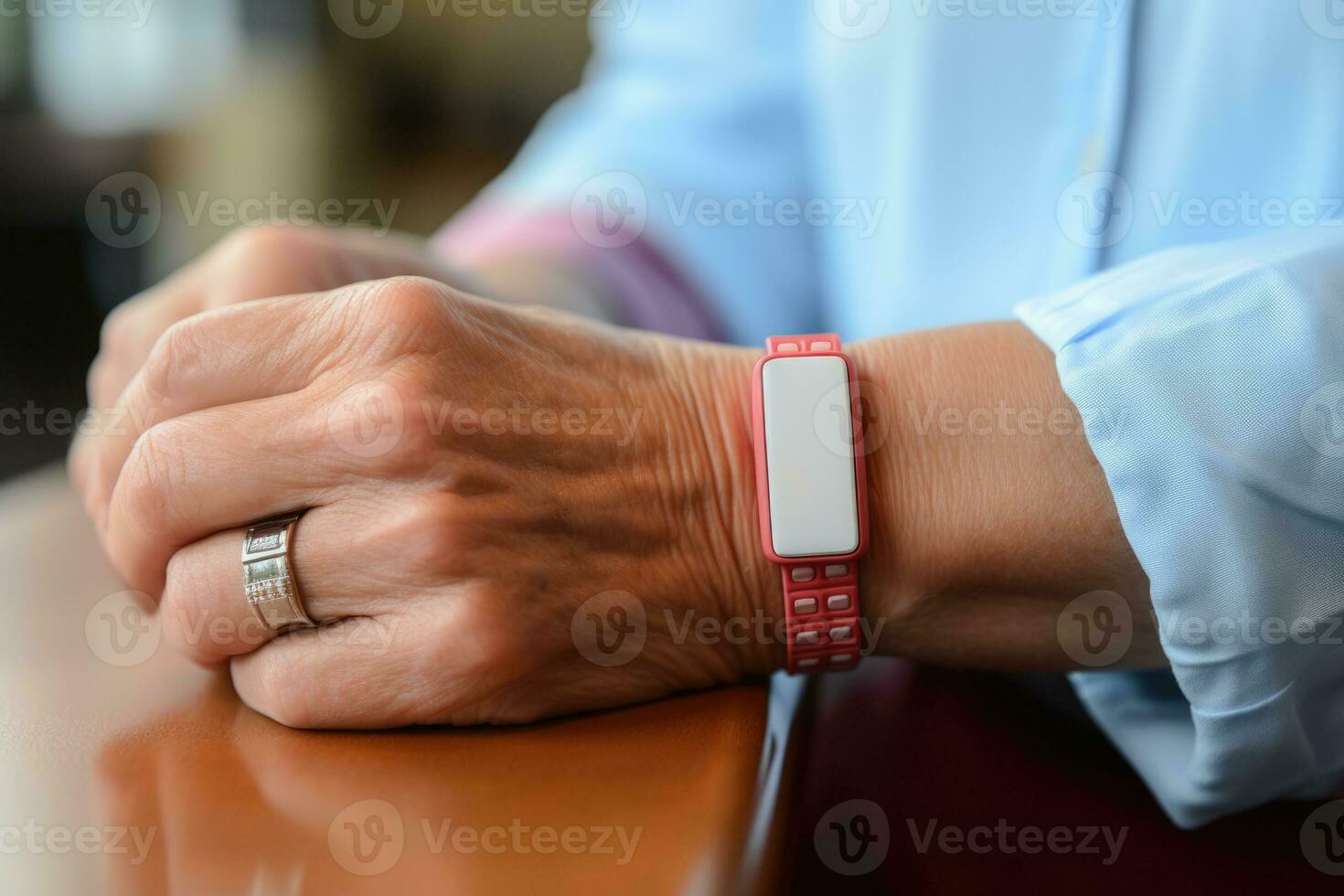 Person wearing medical alert bracelet indicating diabetes during Diabetes Awareness Month photo