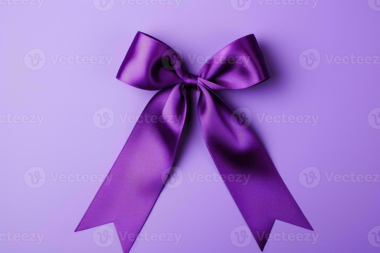 A purple ribbon symbolizing epilepsy awareness isolated on a gradient background photo