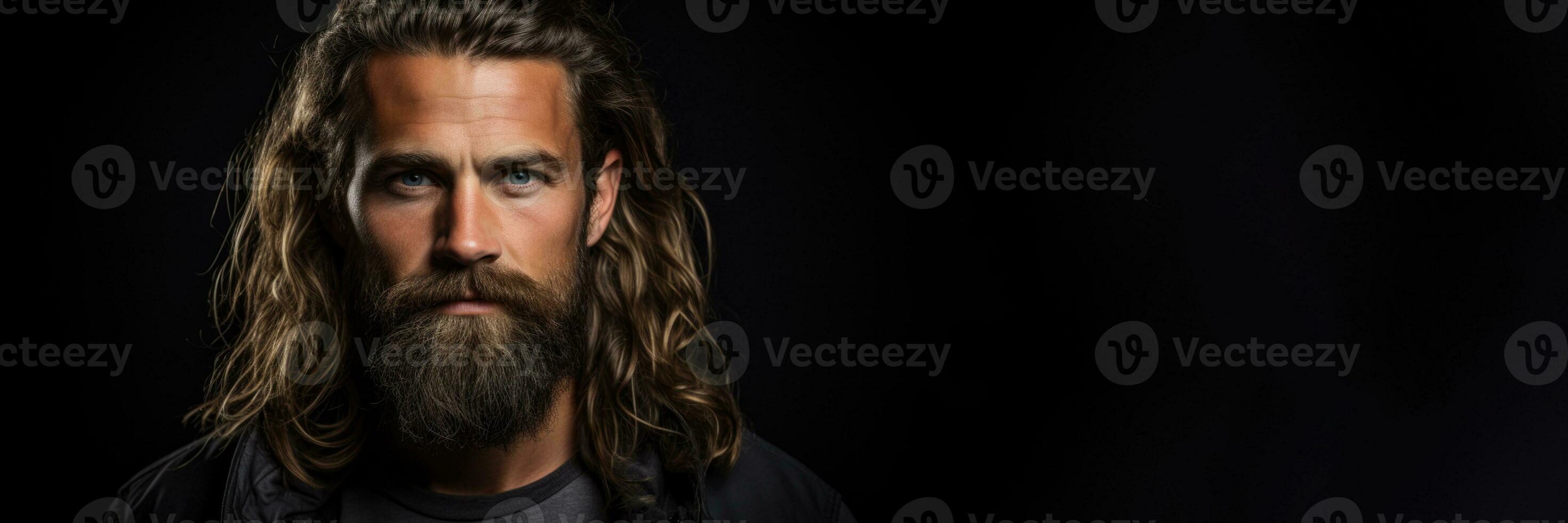 A bearded mans portrait for Movember isolated on a gradient background photo