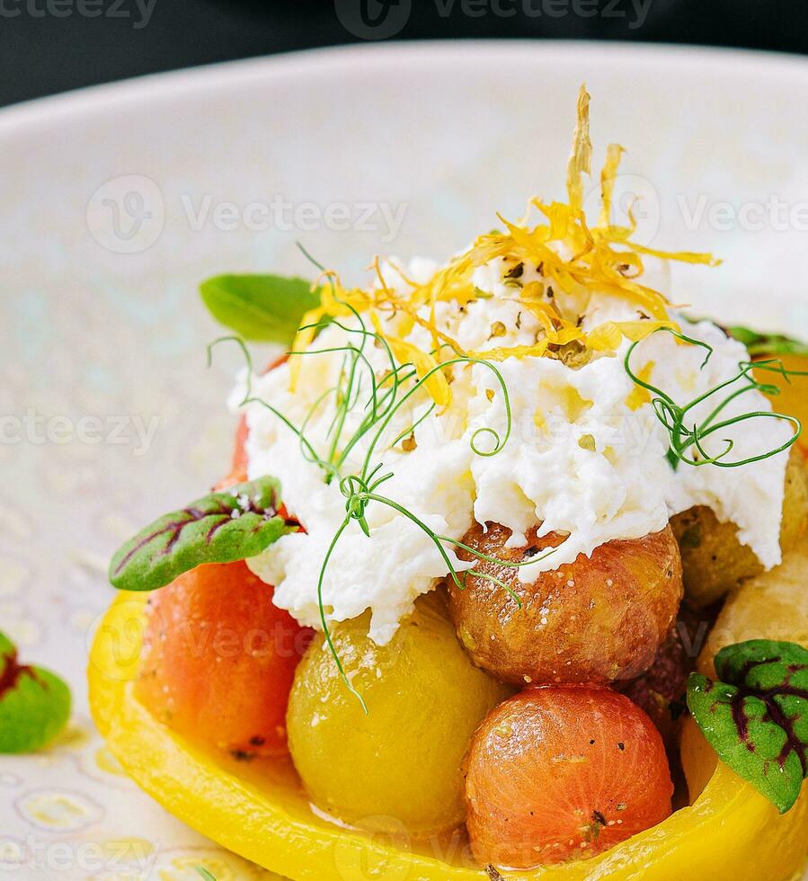 Vegetable salad with grilled peppers and cherry tomatoes photo