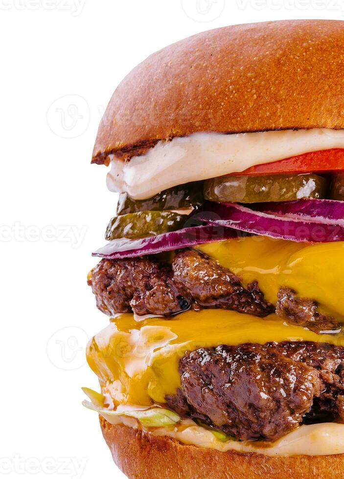 Large cheeseburger with two beef patties grilled photo