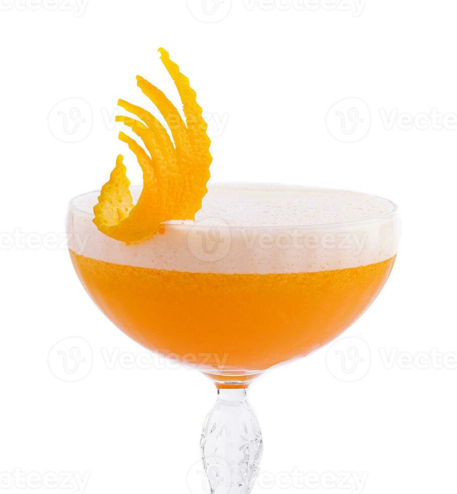 Glass of Ruby Cocktail garnished with orange zest photo