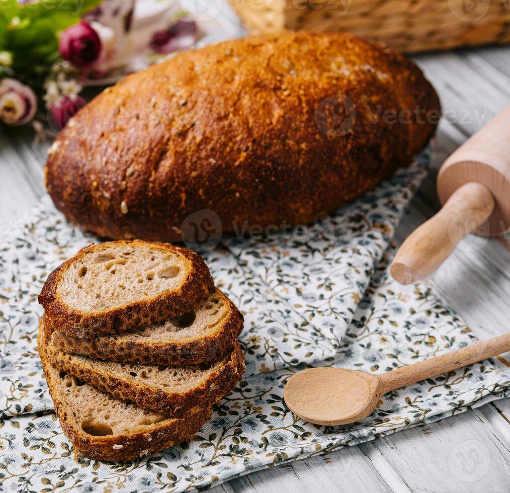 Sliced rye bread close up on table photo