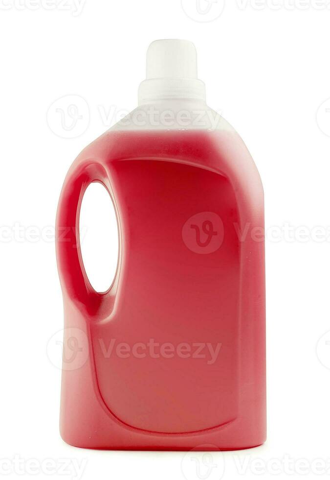 Plastic clean bottle full with red detergent photo