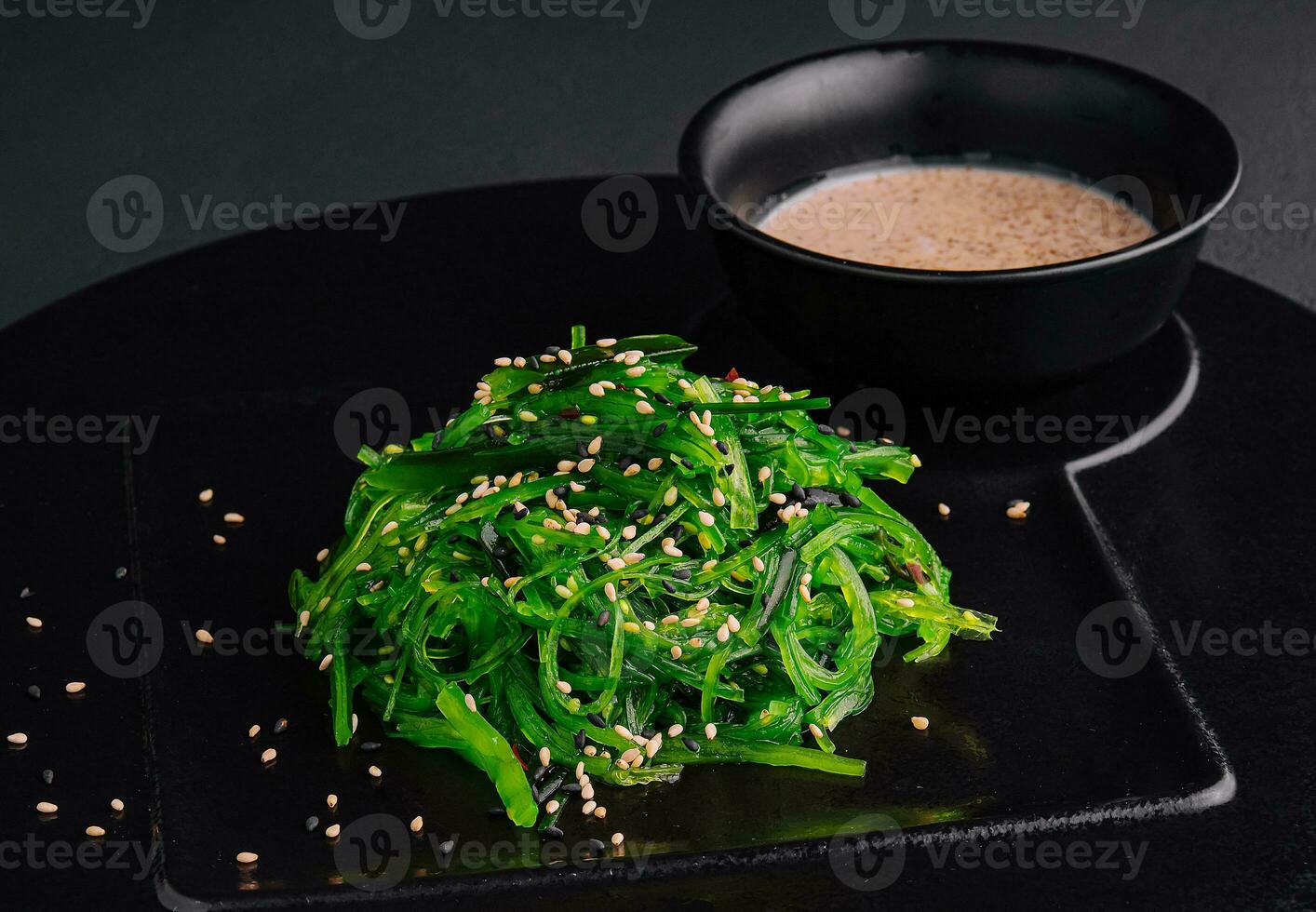 Wakame seaweed salad with sesame seeds photo