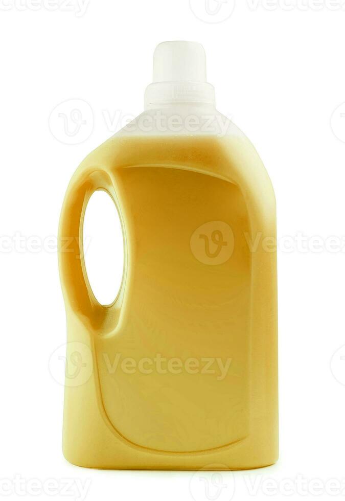 Plastic clean bottle full with yellow detergent photo