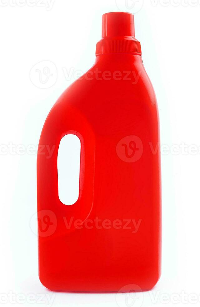 Red Plastic detergent bottle isolated on white background photo