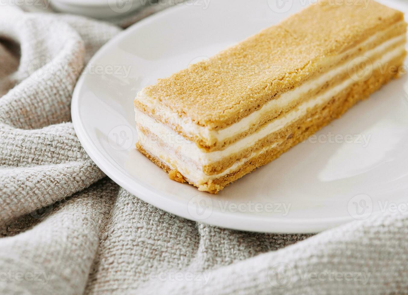 Napoleon cake slices on plate close up photo