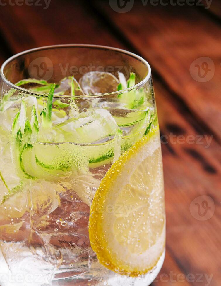 Summer refreshing non alcoholic cocktails with lemon and cucumber photo