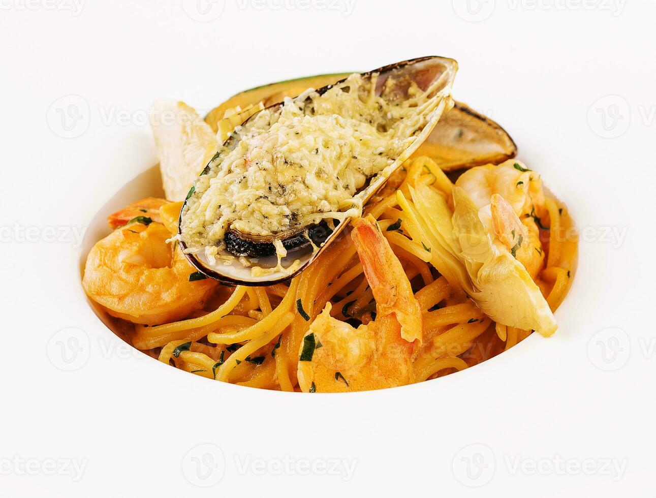 Italian Pasta with seafood isolated on white photo