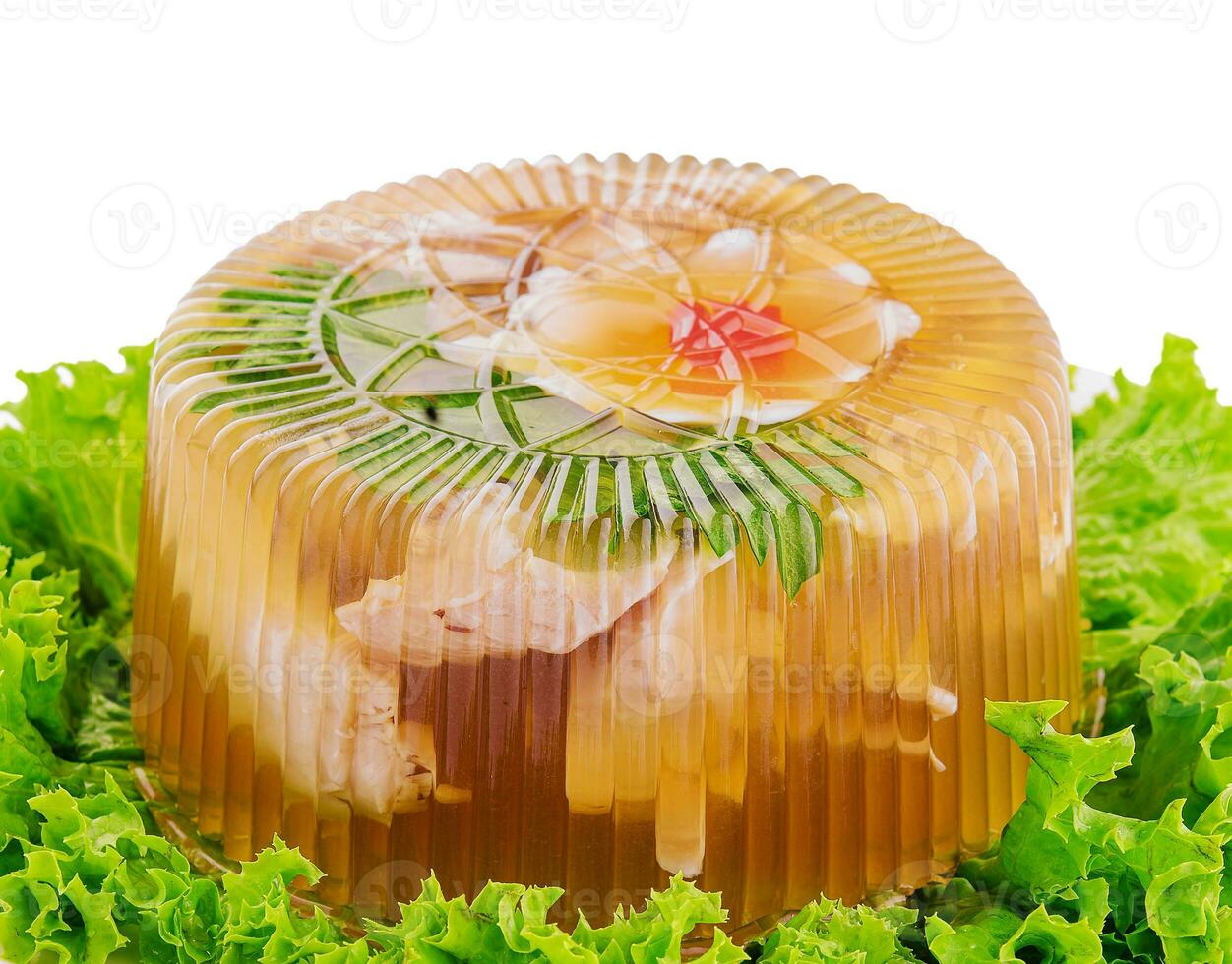 Cold appetizer, portioned jelly of pork, beef and chicken on plate photo