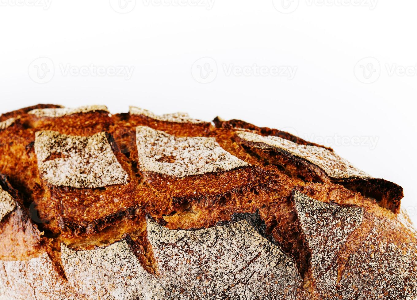 Traditional round rye bread isolated on white background photo