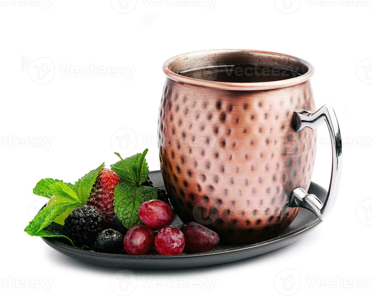 Rosehip tea with aniseed, mint and berries photo