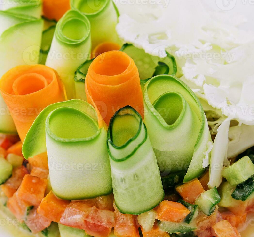 vegetable tartar of cucumber, carrot and tomato photo