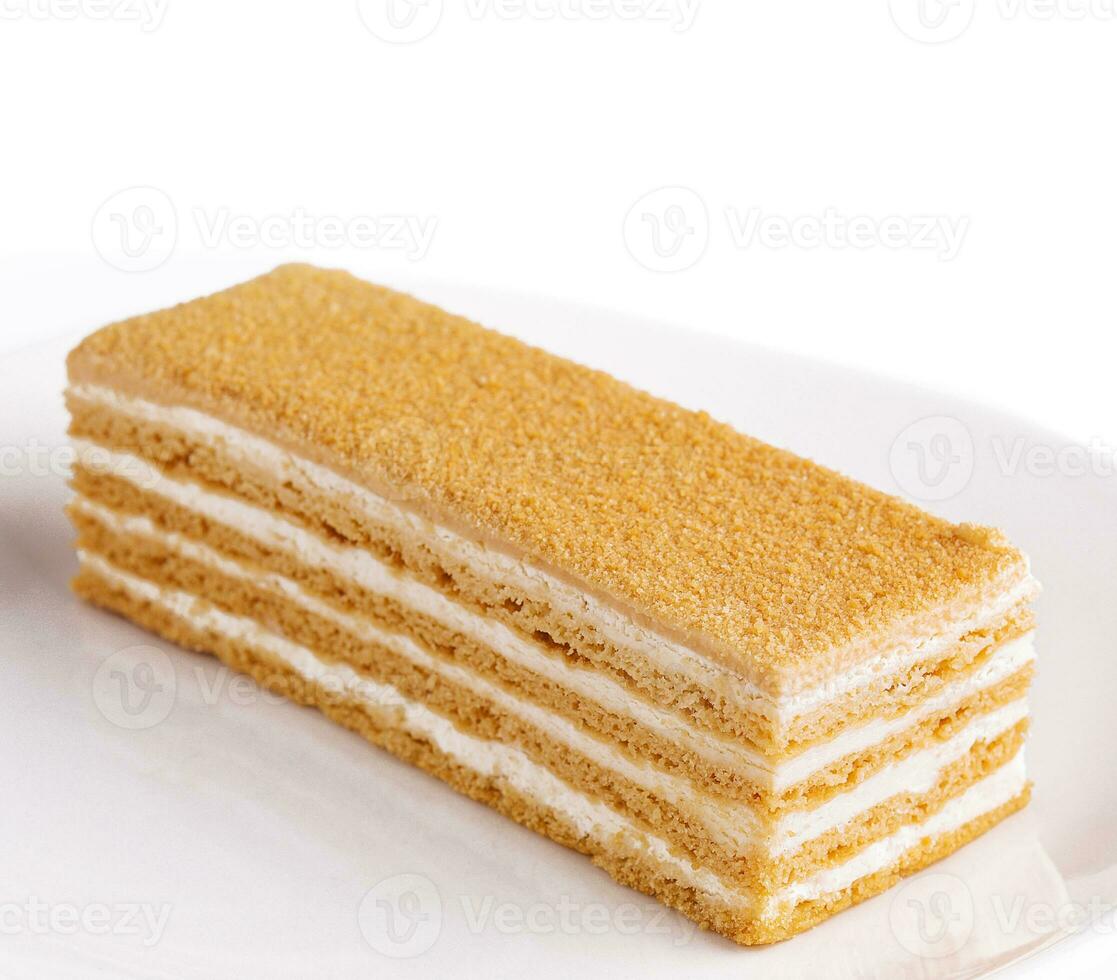 Napoleon slice cake of puff pastry with cream photo