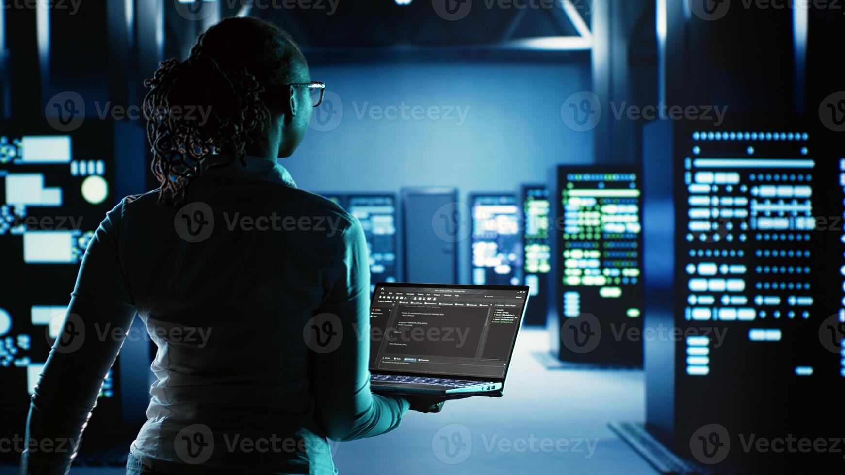 Engineer walking in server room housing advanced infrastructure storing massive datasets. Worker running code on tablet to upgrade data center rigs doing complex computational operations photo