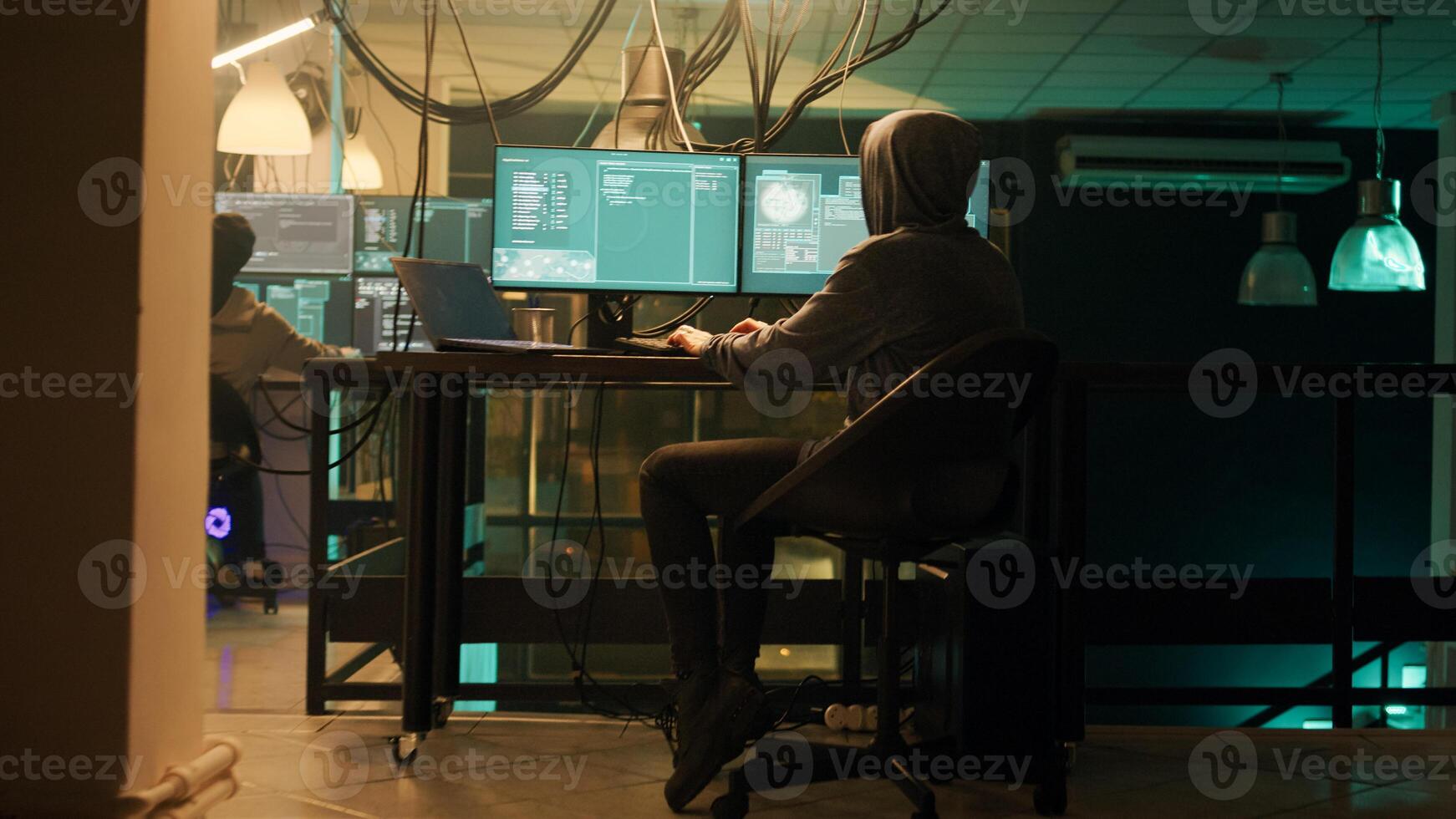 Male spy creating breach of security after gaining access to network system, hacking computer to steal government information. Man doing hacktivism work, ransomware and identity theft. photo