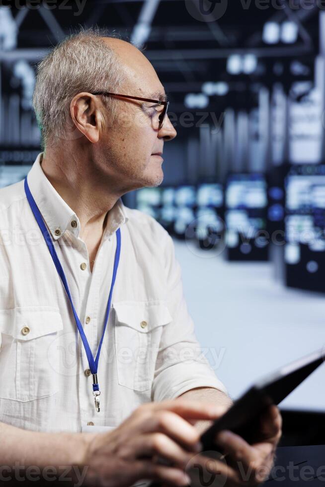 Efficient mechanic in data center providing dedicated VPN servers able to deliver encrypted sensitive data, intensified privacy, online anonymity and secure internet connections to users photo