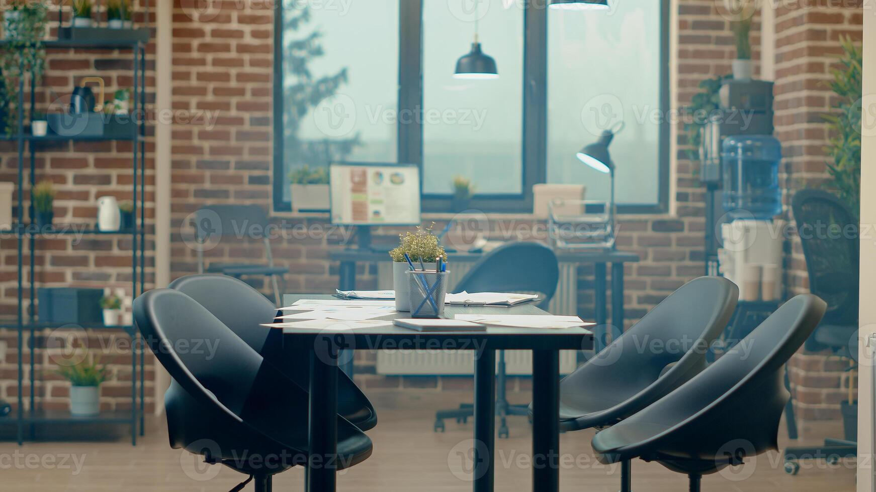 Empty office space with data documents, desk filled with reports and analytics research on files. Startup meeting boardroom used for global corporate development, firm partnership. photo