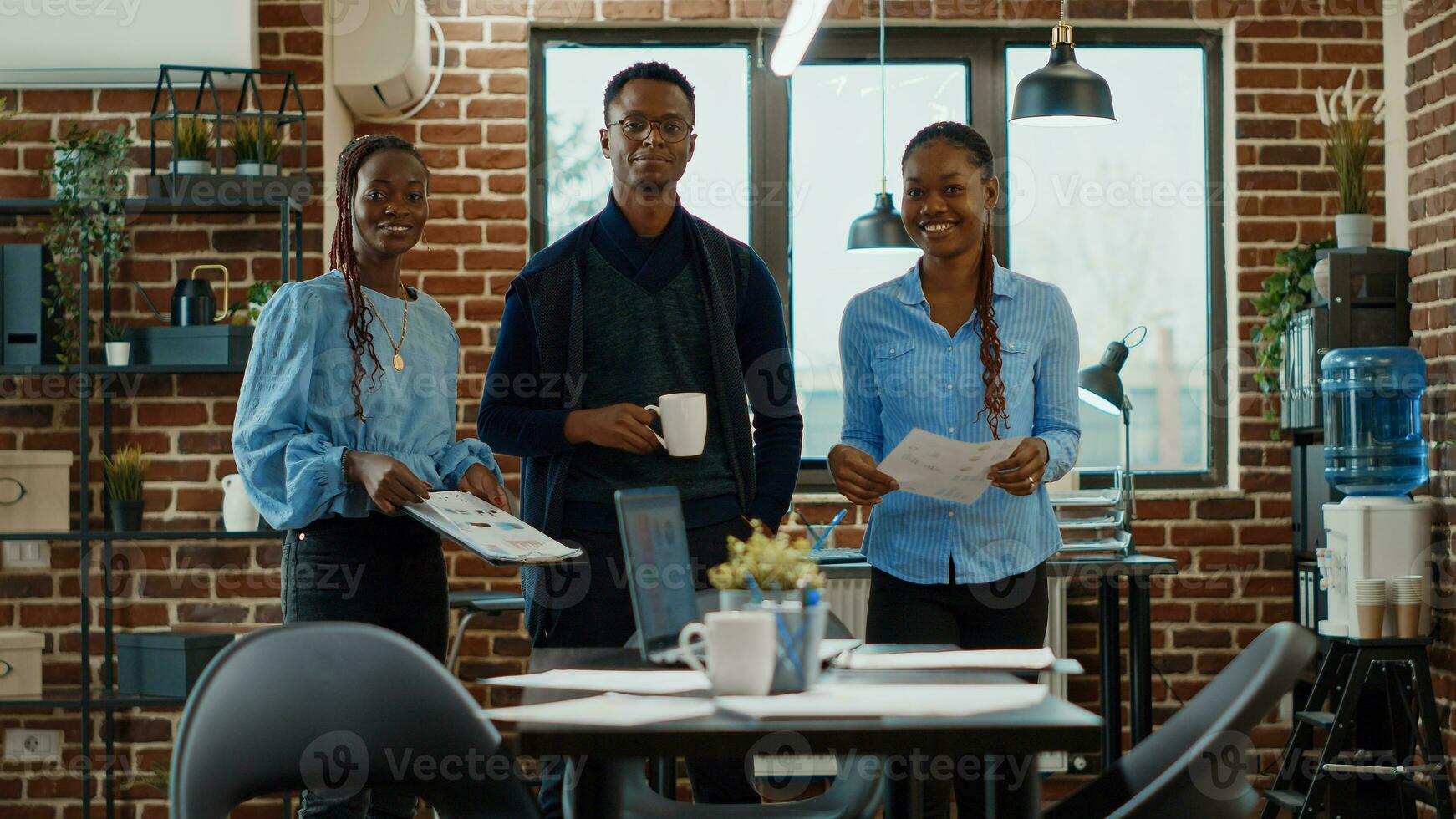 Team of workers collaborating in office, discussing about new business strategy in coworking space. Company analysts reviewing annual data reports to increase profit, global agency job. photo